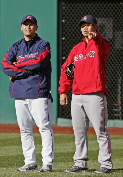 Boston's Daisuke Matsuzaka, right, talks with Cleveland Indians relief pitcher Masa Kobayashi during batting practice before Tuesday's game.