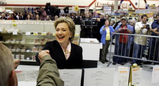 Hillary Clinton shook hands yesterday as she entered a campaign event at Sunshine Foods in Brandon, S.D.