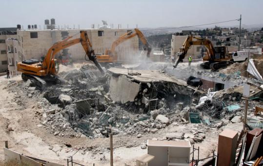 An Israeli army bulldozer destroyed a Palestinian house in the east Jerusalem neighborhood of Atur last week.