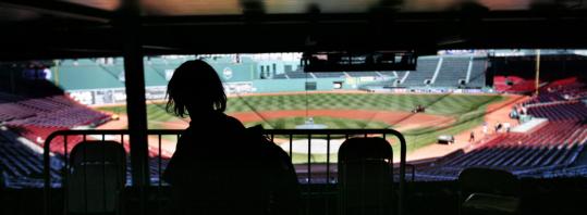 Cheyenne Johnson, 12, a pupil at Woodrow Wilson Middle School, looked out over the field at Fenway Park before a tour last month. For several days last week, the MBTA's website did not include Fenway Park in its list of key locations.
