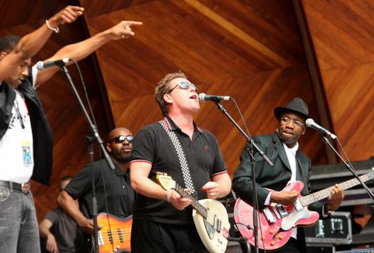 Lynval Golding (right) of the Specials joined members of the English Beat including Dave Wakeling (center) during EarthFest at the Hatch Shell.