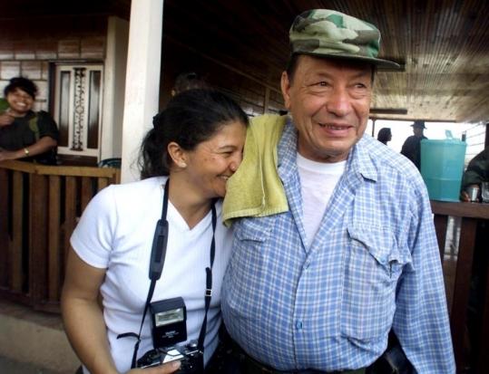 The top commander of the Revolutionary Armed Forces of Colombia, Pedro Antonio Marín, better known as 'Manuel Marulanda,' hugged a companion 'Sandra.'