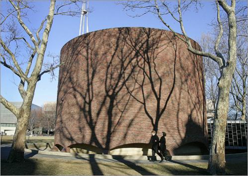 Gabrielle Deifik and Brad Schuller stroll by Kresge Chapel at MIT in February.