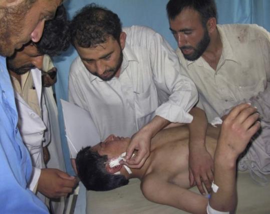 A boy was treated in Jalalabad, Afghanistan, yesterday after he was allegedly injured by US-led coalition air strikes.