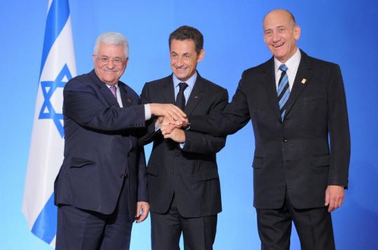 Mahmoud Abbas (from left), Nicolas Sarkozy, and Ehud Olmert at the Elysee Palace in Paris before a summit.