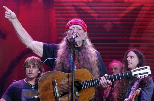 Willie Nelson, shown at last year's benefit concert in New York, says the group's mission remains one of keeping family farmers on their land.