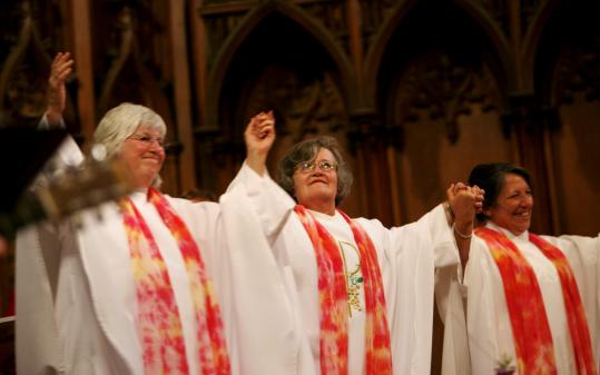 From left, Judy Lee of Florida, Gloria Carpeneto of Maryland, and Gabriella Velardi Ward of New York, during the ceremony in which the Roman Catholic Womenpriests organization said they were ordained as priests.