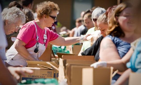 A food bank gives out supplies in Coeur D'Alene, Idaho. More than 400,000 Americans filed unemployment claims last week.