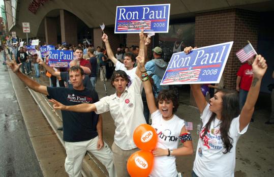 Joyous Ron Paul supporters lined the street yesterday in front of the Target Convention Center in Minneapolis. Paul appeared on stage to the roars of fervent followers, most of whom traveled long distances and waited as long as eight hours to see him.