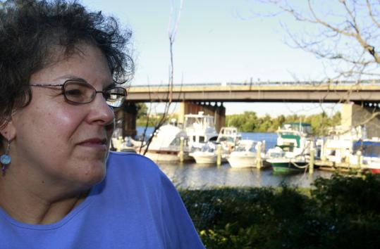 Ellin Reisner, shown near the Winter Hill Yacht Club, says Draw 7 Park is one of the largest pieces of open space in Somerville.