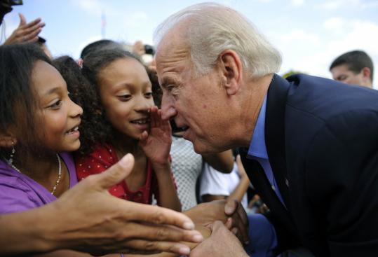 Democratic vice presidential candidate Joe Biden greeted youngsters during a rally at Detroit Public Library Sunday. Biden is scheduled to meet Republican vice presidential candidate Sarah Palin in a nationally televised debate tomorrow.