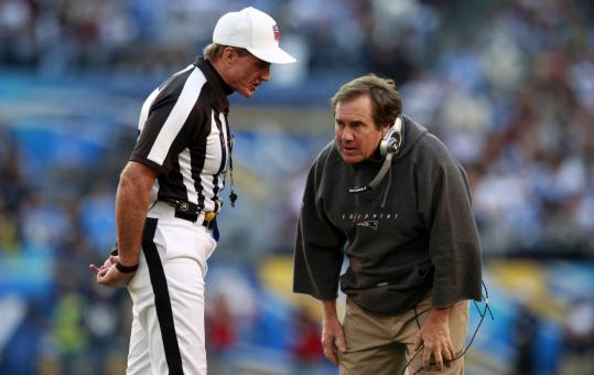 Just a hunch, but it doesn't appear Bill Belichick is enjoying this explanation from referee Bill Leavy in the first quarter.
