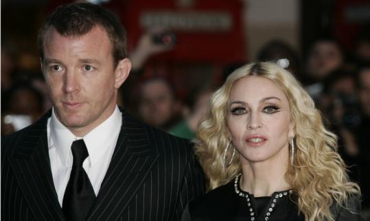 Guy Ritchie and Madonna will end their eight-year marriage.