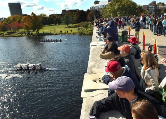 Spectators watched scullers pass under the Weeks footbridge yesterday during the the 44th Head of the Charles Regatta. ''I would hate to depart from this world,'' said rower Nicholas Daniloff, 73, ''without having taken part of that show, at least once.''