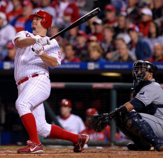 Pitcher Joe Blanton of the Phillies blasts a solo home run off Tampa Bay flame-thrower Edwin Jackson in the fifth inning.