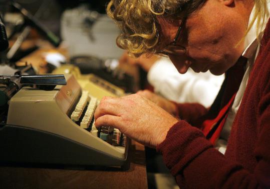 A member of the Boston Typewriter Orchestra at work at T.T. the Bear's last week.