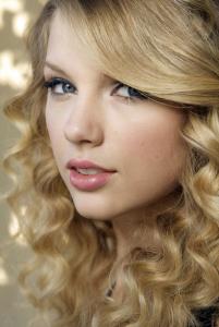 Swift's ''Fearless'' fits somewhere between commercial country and Top 40.