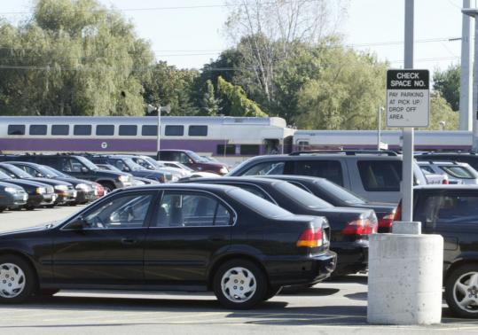 The daily fee at Westborough's MBTA lot, and all other T parking facilities, will rise by $2 on Saturday. The agency says it needs the money to pay $53 million in back pay to its workers.