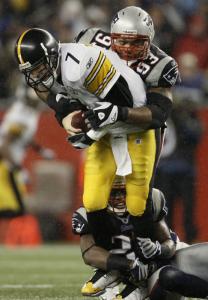 Richard Seymour (top) helps wrap up Ben Roethlisberger in Sunday's game.