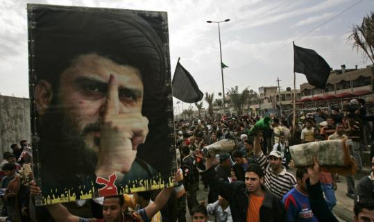 Followers of Shi'ite cleric Moqtada al-Sadr held a banner featuring his portrait during an anti-US protest last month.