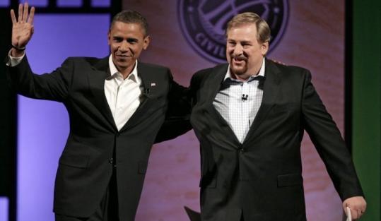 Then-candidate Barack Obama was greeted by pastor Rick Warren during a forum at Saddleback Church in August.