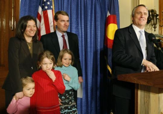 Governor Bill Ritter of Colorado named Denver's public school superintendent, Michael Bennet (left), to fill a Senate vacancy.