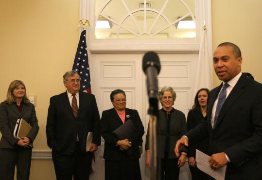 At the State House yesterday, Governor Deval Patrick spoke after conferring with officials about financing the state's healthcare system. He wants to examine cost containment from all angles.