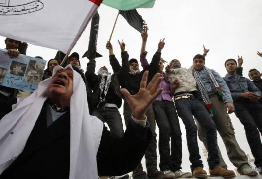 Jordanians shouted anti-Israel slogans during a protest against the Israeli attacks on Gaza, outside the United Nations Relief and Works Agency office in Amman this week.
