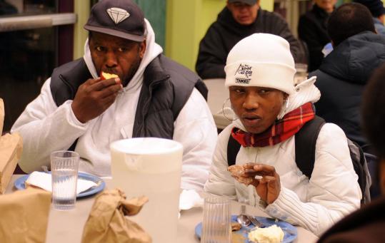 David Browner and Nancy Sandy talked with Steven Gray (not pictured) as they ate dinner at Shepherd's Table in Silver Spring, Md., last week.