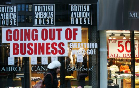 Like many other retailers in this harsh economic environment, the British American House clothing store in New York displays a ''going out of business'' sign.