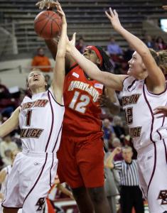 BC's Ayla Brown, left, and Stefanie Murphy combine to keep the ball out of the reach of Maryland's Lynetta Kizer.