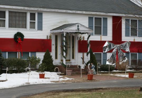 Holiday decorations on a house in Bridgewater. Some people couldn't bring themselves to remove displays of good cheer.