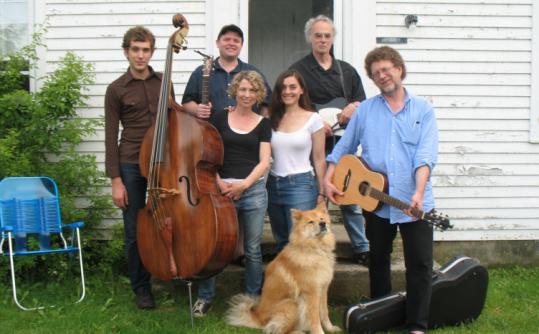 The members of the Dog House Band (from left): Lee Clay Johnson, Benjamin Hartlage, Rebecca Chace, Erica Plouffe Lazure, David Gates, Sven Birkerts, and Gates's dog, Jesse.