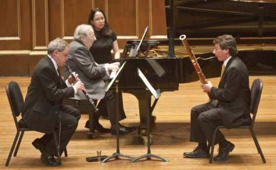 From left: John Ferrillo, André Previn, and Richard Svoboda perform Previn's Trio for Oboe, Bassoon and Piano on Sunday.