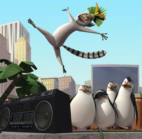 King Julien the lemur joins (from left) Skipper, Rico, Private, and Kowalski 