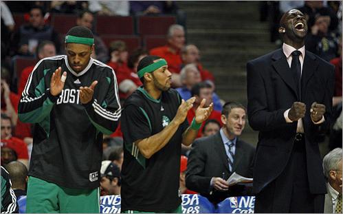 As the romp continued, Paul Pierce (left), Eddie House and Kevin Garnett (right) continued to enjoy themselves.