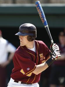 Bill Kiley started on three state Division 1 championship squads for Boston College High School. This year, he's batting .333 as the team's first baseman; in 2007, he along with goalie Joe Cannata (30) and Mike Vasilchuk (22) celebrated the team's victory in the Super 8 championship; last fall, he fired a pass against Taunton.