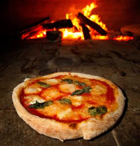 Orta's pizza and other dishes are authentic Italian - The ...