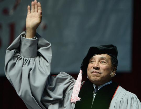 PHOTOS BY WENDY MAEDA/GLOBE STAFFSmokey Robinson, who recieved an honorary degree, spoke at Berklee College of Music's commencement, held at Agganis Arena in Boston yesterday. Linda Ronstadt (below left) also received an honorary degree. Adam Timmerman waved to his parents during the ceremony.