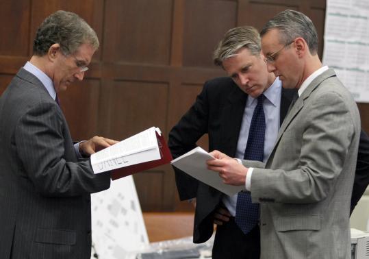 Jeffrey Denner and Timothy J. Bradl, defense lawyers for the man who calls himself Clark Rockefeller, met with Suffolk Assistant District Attorney David Deakin (right) before yesterday's session. The judge said the defense team had courted media attention.