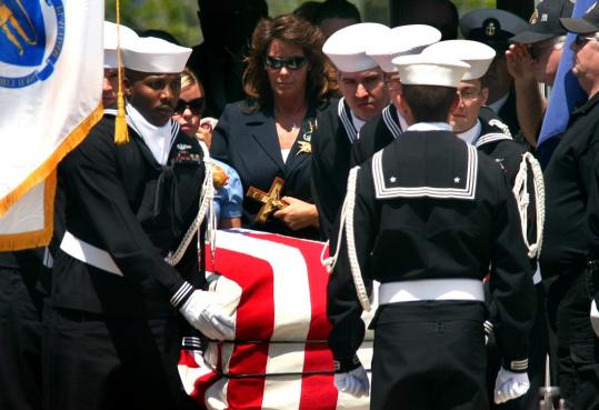 Sailors carried the coffin of Tyler J. Trahan from St. John Neumann Catholic Church in East Freetown yesterday. Trahan was killed April 30 during combat operations in Iraq.