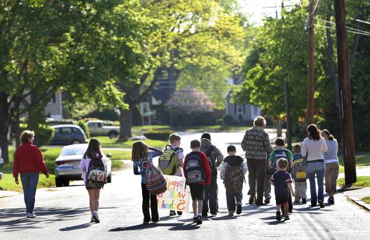 Dolbeare Elementary School students in Wakefield participate in a ''walking school bus'' on Massachusetts Walk to School Day earlier this month.