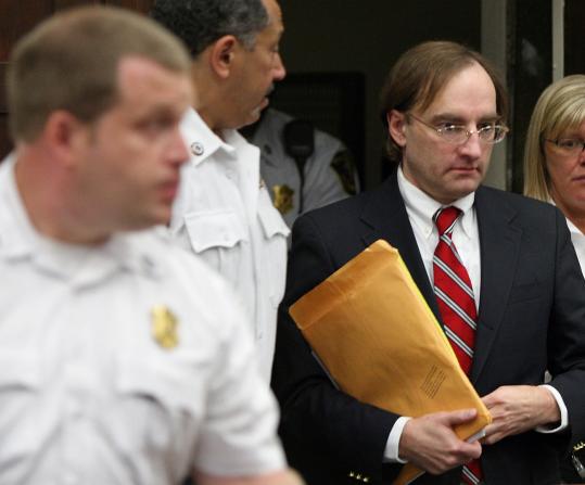 The man who calls himself Clark Rockefeller entered Suffolk Superior Court yesterday for a pretrial hearing.