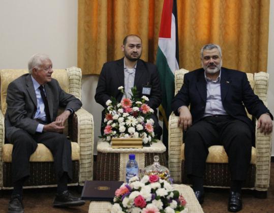 Jimmy Carter (left) met with Ismail Haniyeh, head of Gaza's Hamas government, Tuesday. The United States considers Hamas a terror group and refuses to deal with it directly.