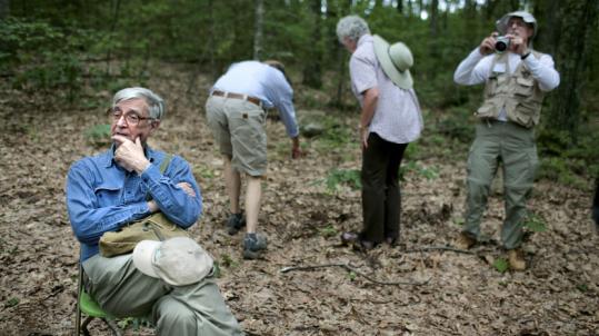 E.O. Wilson (left) and fellow naturalists spent July 4 taking an inventory of plant and animal species in Estabrook Woods in Concord.
