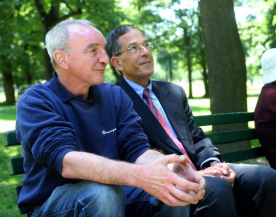 Rob (left) and Peter Resnik on a bench on the Common, where their friendship began.