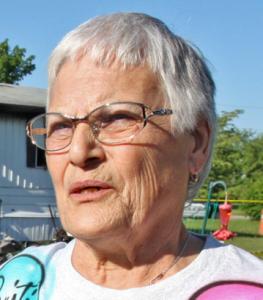 Madeline Castelluzzo, a neighbor and close friend of Dorothy Boreham, tried to put out the fire with a garden hose.