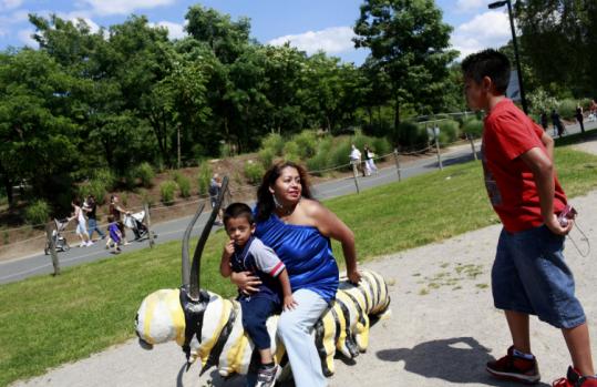 Silvia Valladares, with sons (from left) Javier and Christopher Perez, enjoyed Franklin Park Zoo Sunday.