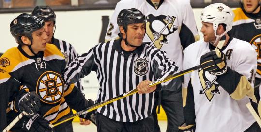 Then with the Pittsburgh Penguins, Ryan Whitney (right) squared off against the Bruins’ Milan Lucic in January.