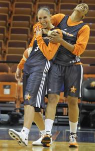 Diana Taurasi (left), goofing around with Tina Thompson at All-Star practice, looks comfortable back in Connecticut.